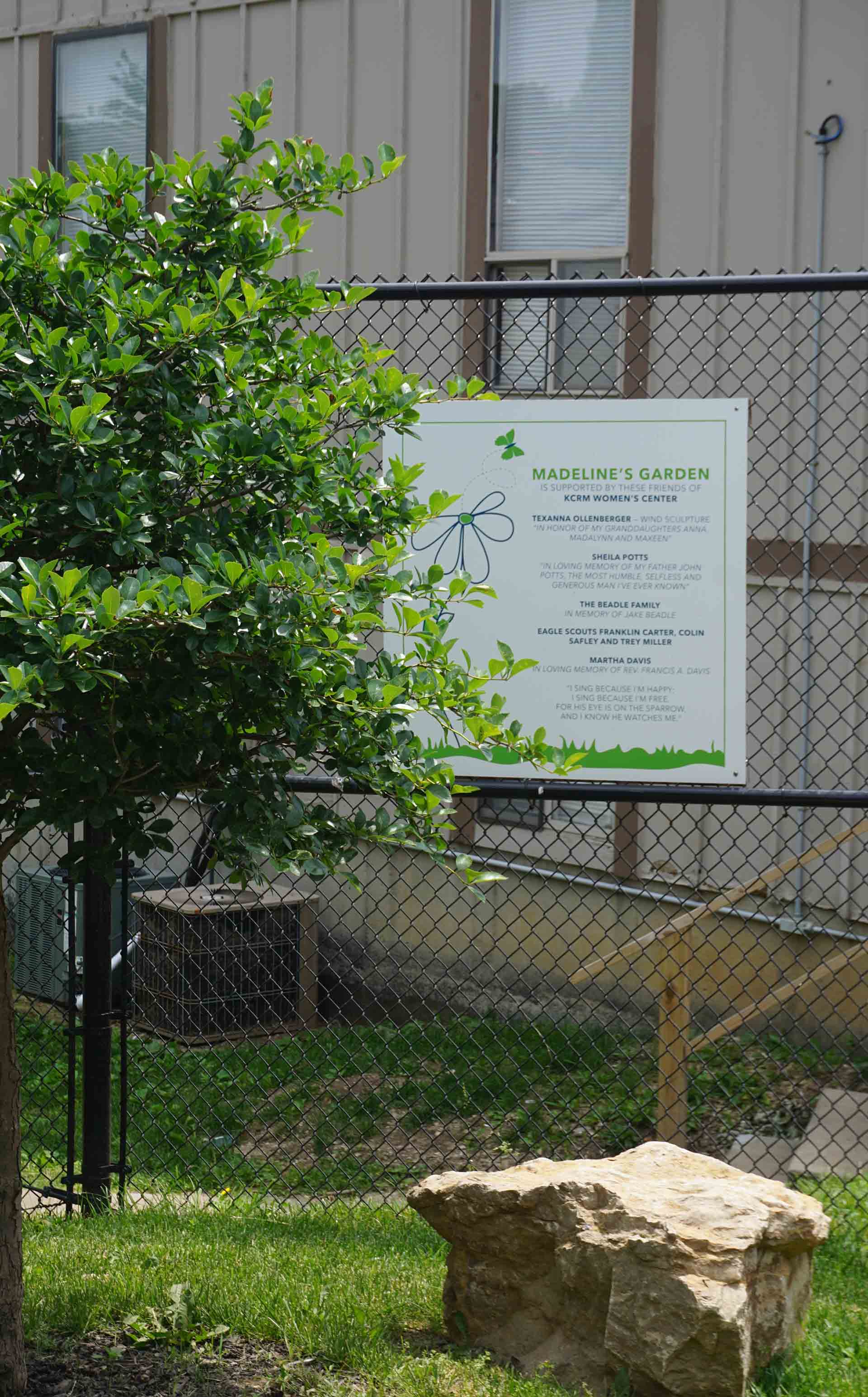 Madeline's Garden sign on gate