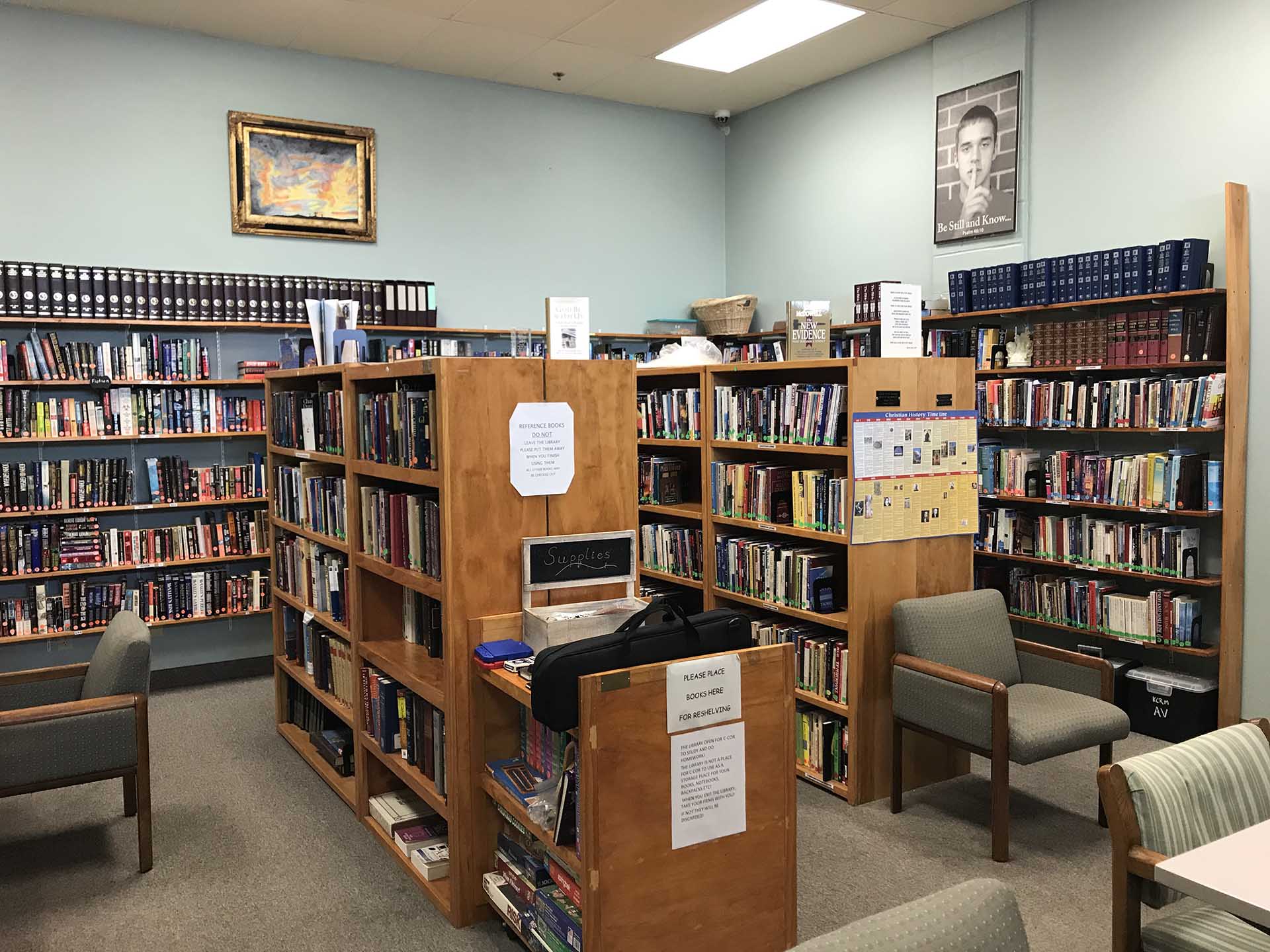 Library at Shelter KC with shelves of books