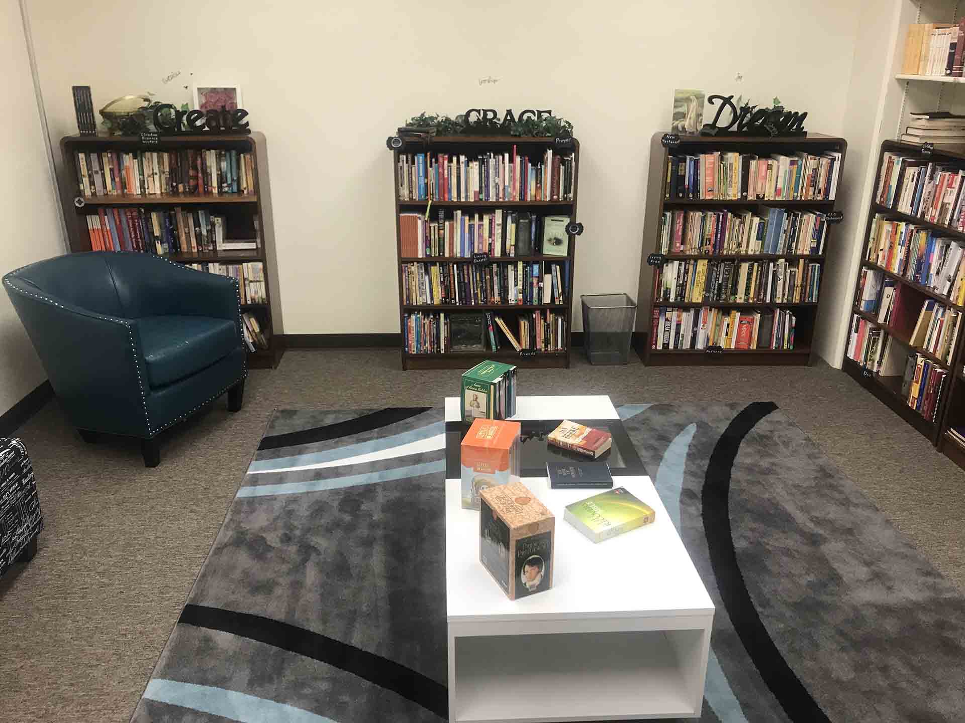 Library at Shelter KC with shelves full of books