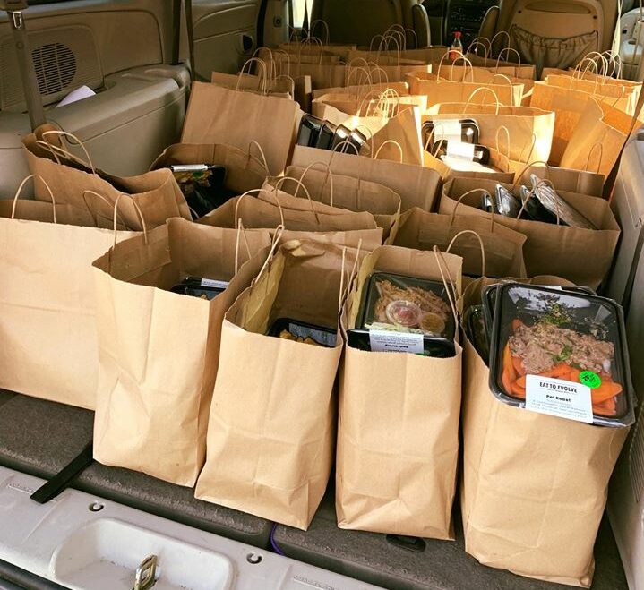 packages of food in the back of a car