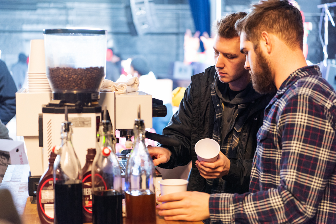 men serving coffee