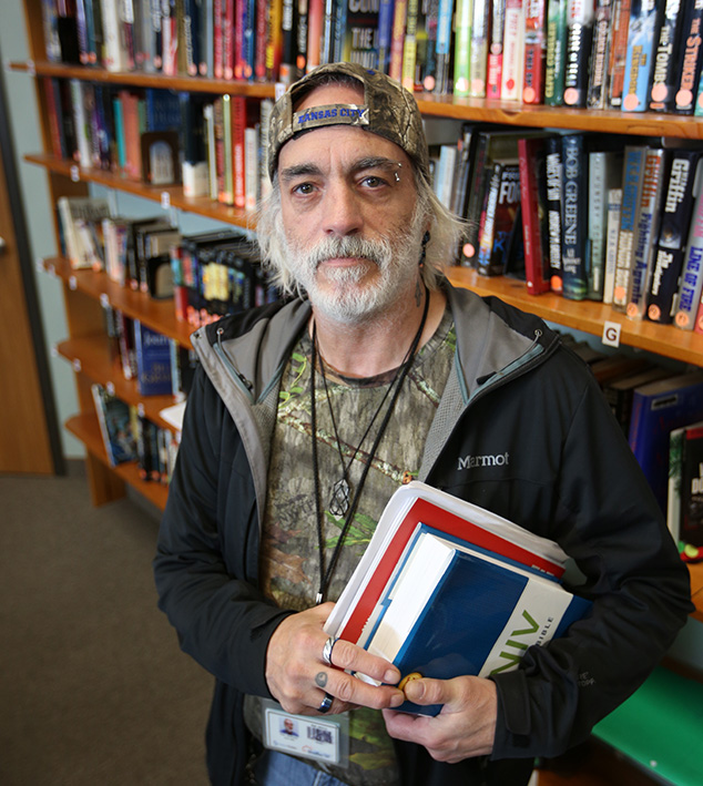picture of a man in a library